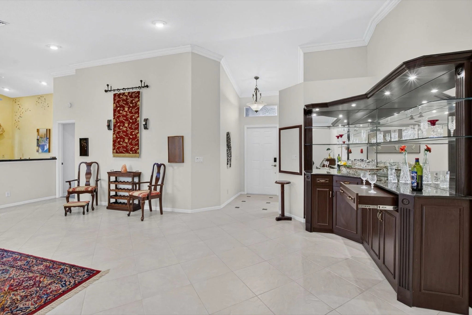 Foyer With a Built In Dry Bar