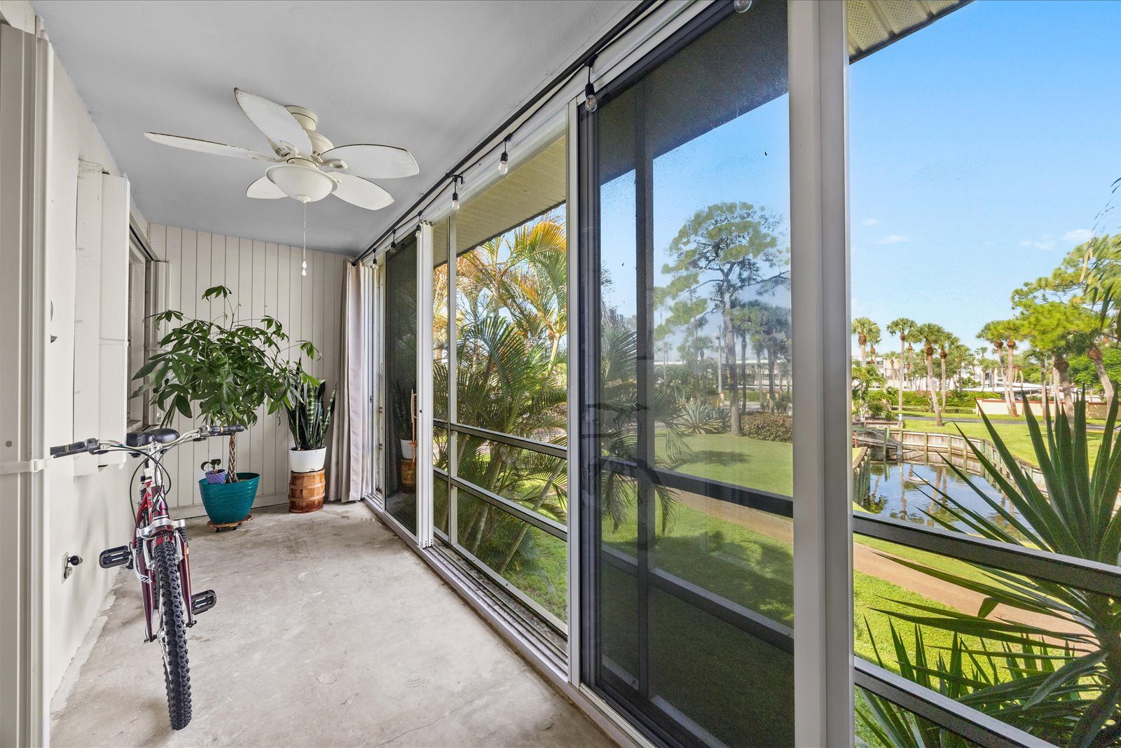 Screened Lanai With a Green Space View